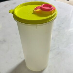 Vintage 80s Tupperware handolier pitcher with flip top lid in neon yellow / pink